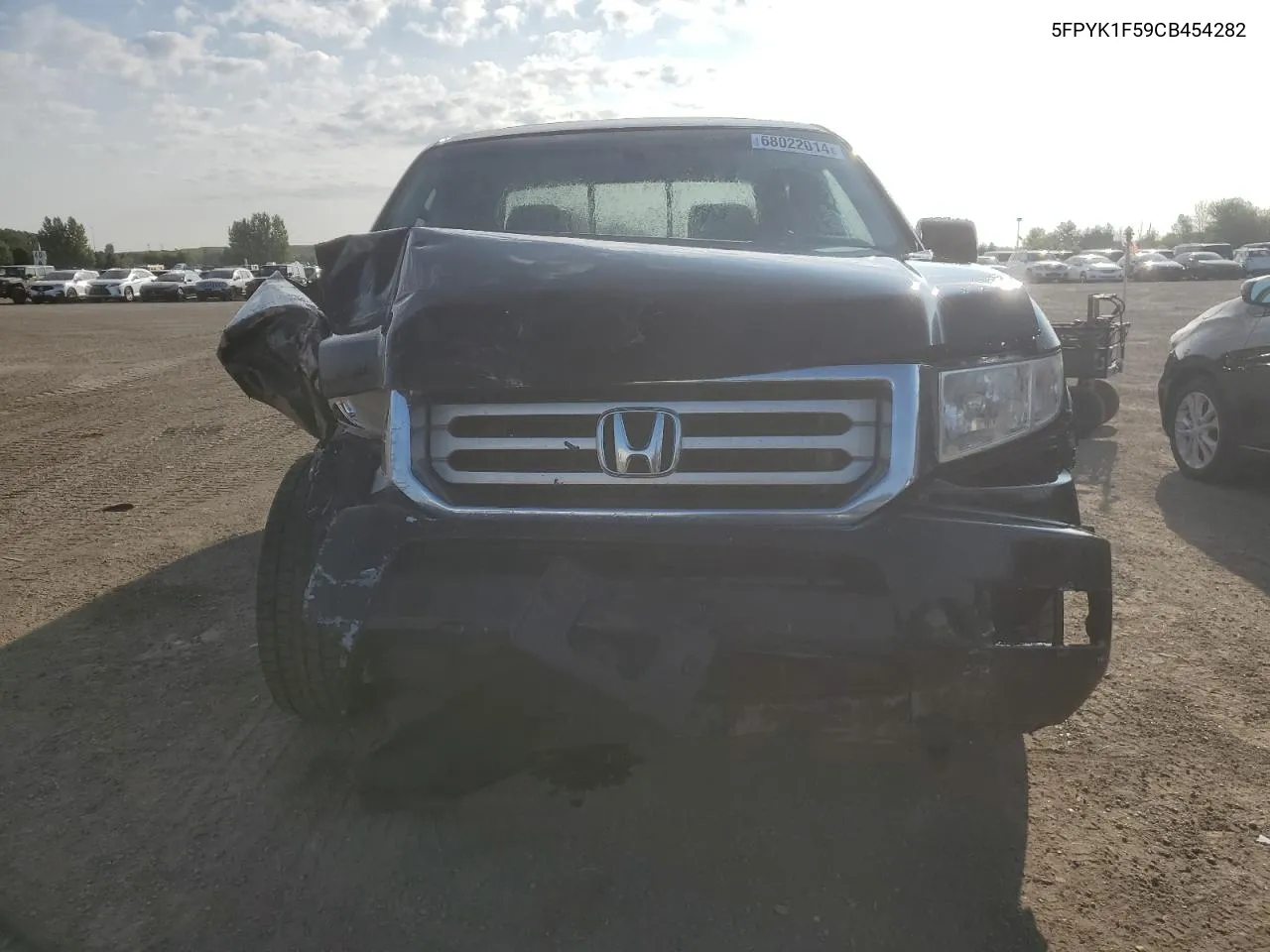 2012 Honda Ridgeline Rtl VIN: 5FPYK1F59CB454282 Lot: 68022014