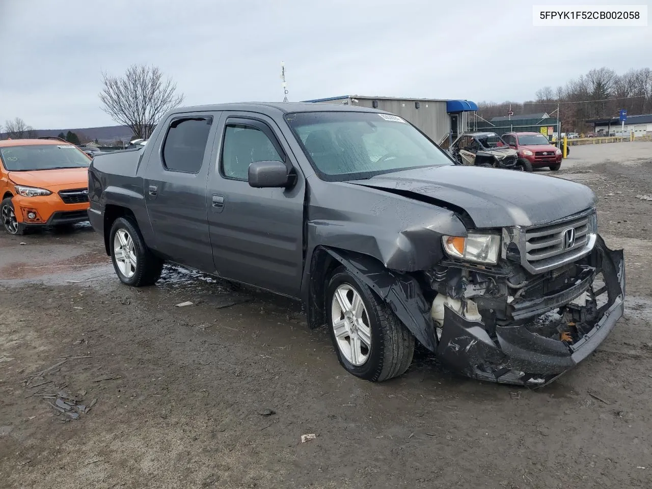 2012 Honda Ridgeline Rtl VIN: 5FPYK1F52CB002058 Lot: 80638994