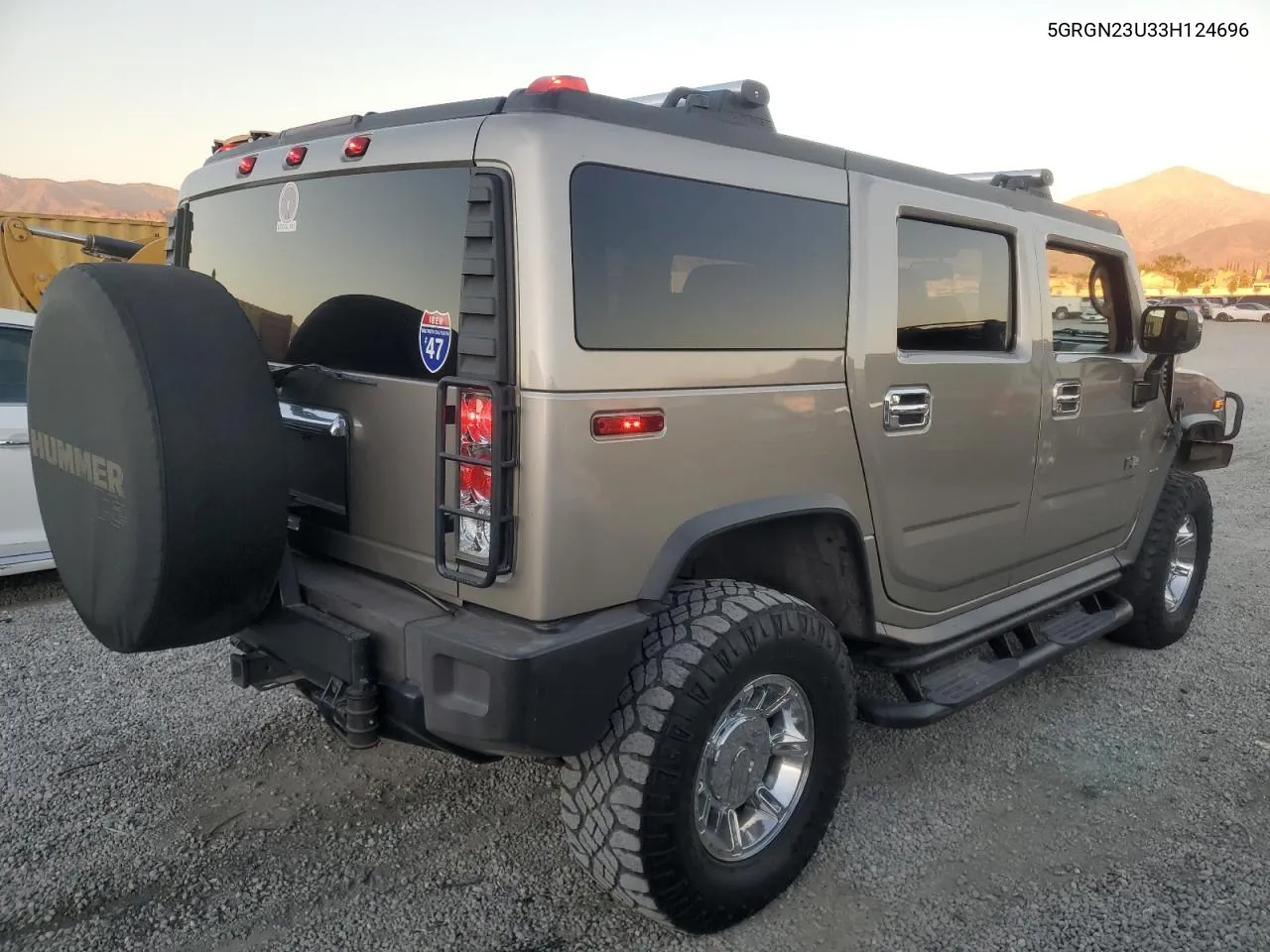 2003 Hummer H2 VIN: 5GRGN23U33H124696 Lot: 79452004