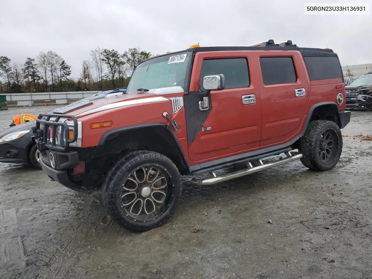 2003 Hummer H2 VIN: 5GRGN23U33H136931 Lot: 80671794