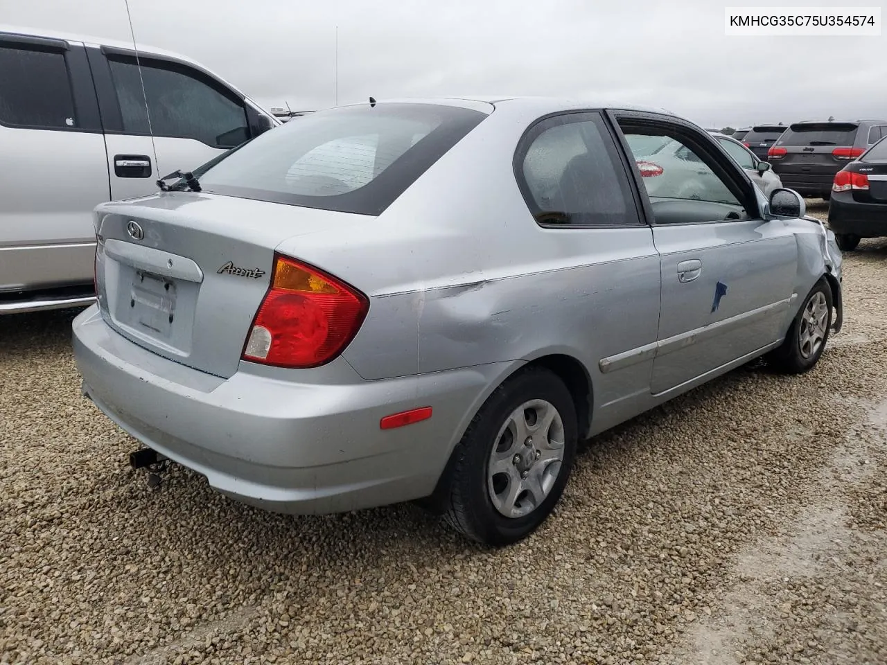 2005 Hyundai Accent Gs VIN: KMHCG35C75U354574 Lot: 74931444