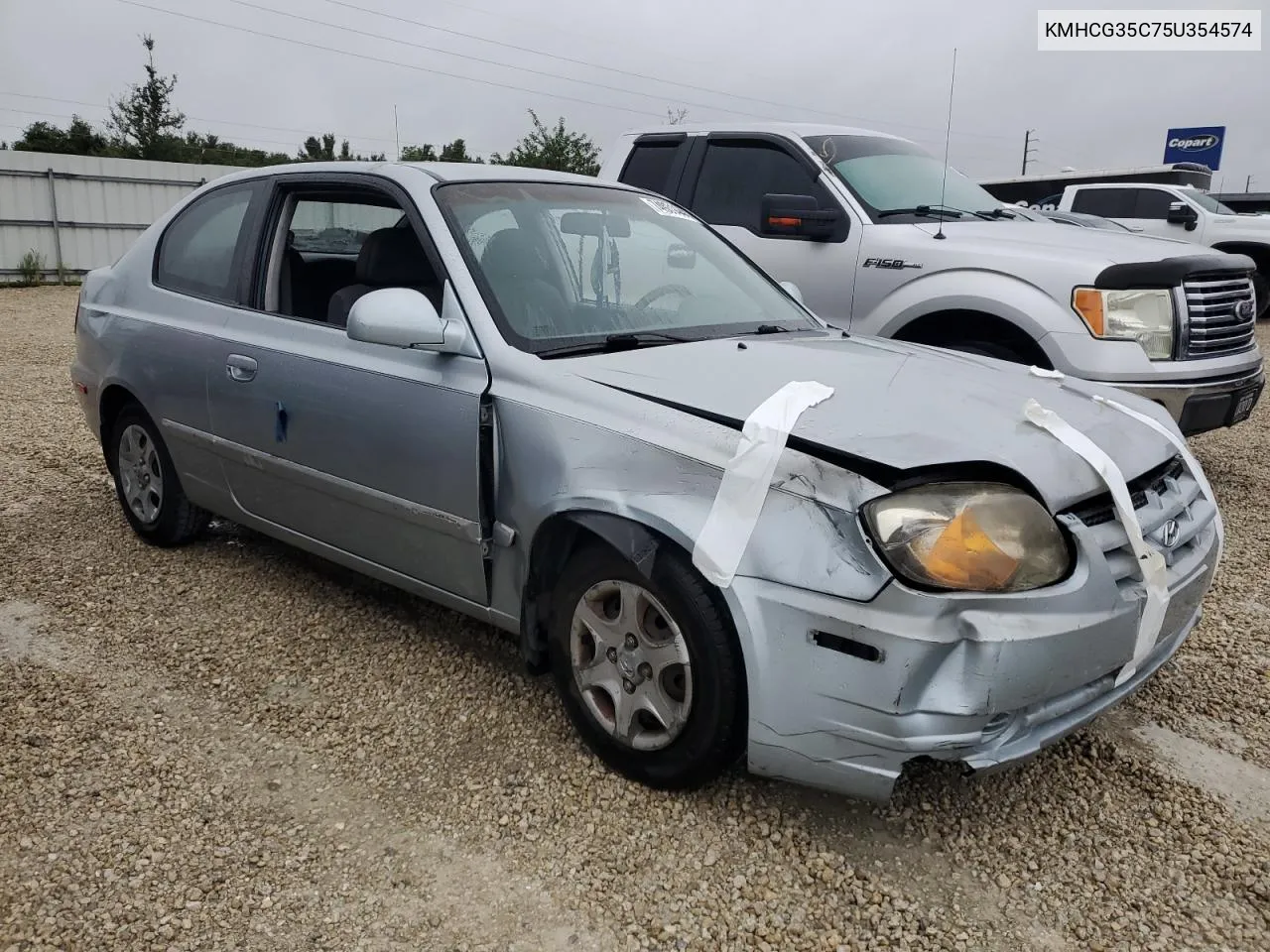 2005 Hyundai Accent Gs VIN: KMHCG35C75U354574 Lot: 74931444