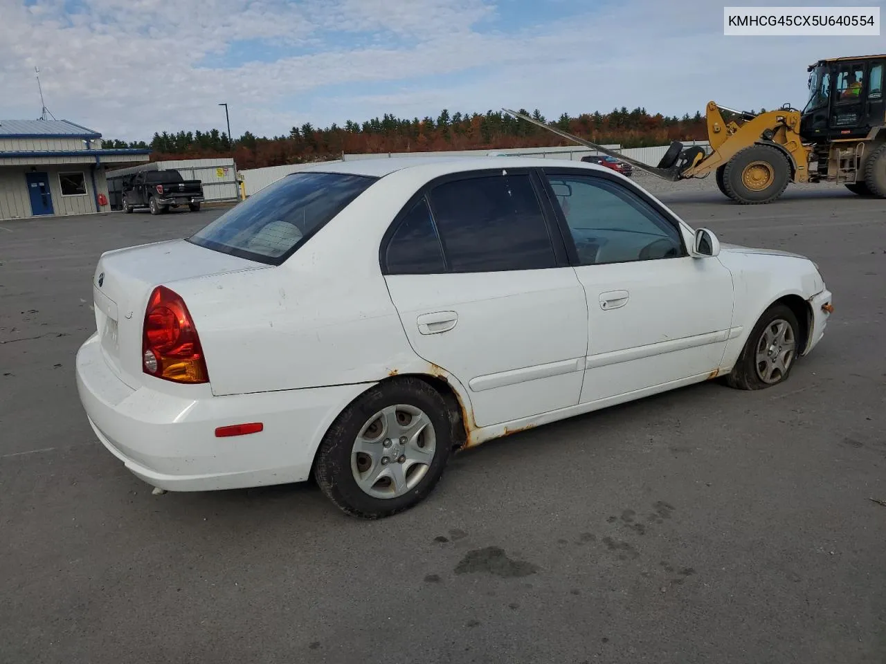 2005 Hyundai Accent Gl VIN: KMHCG45CX5U640554 Lot: 77653664