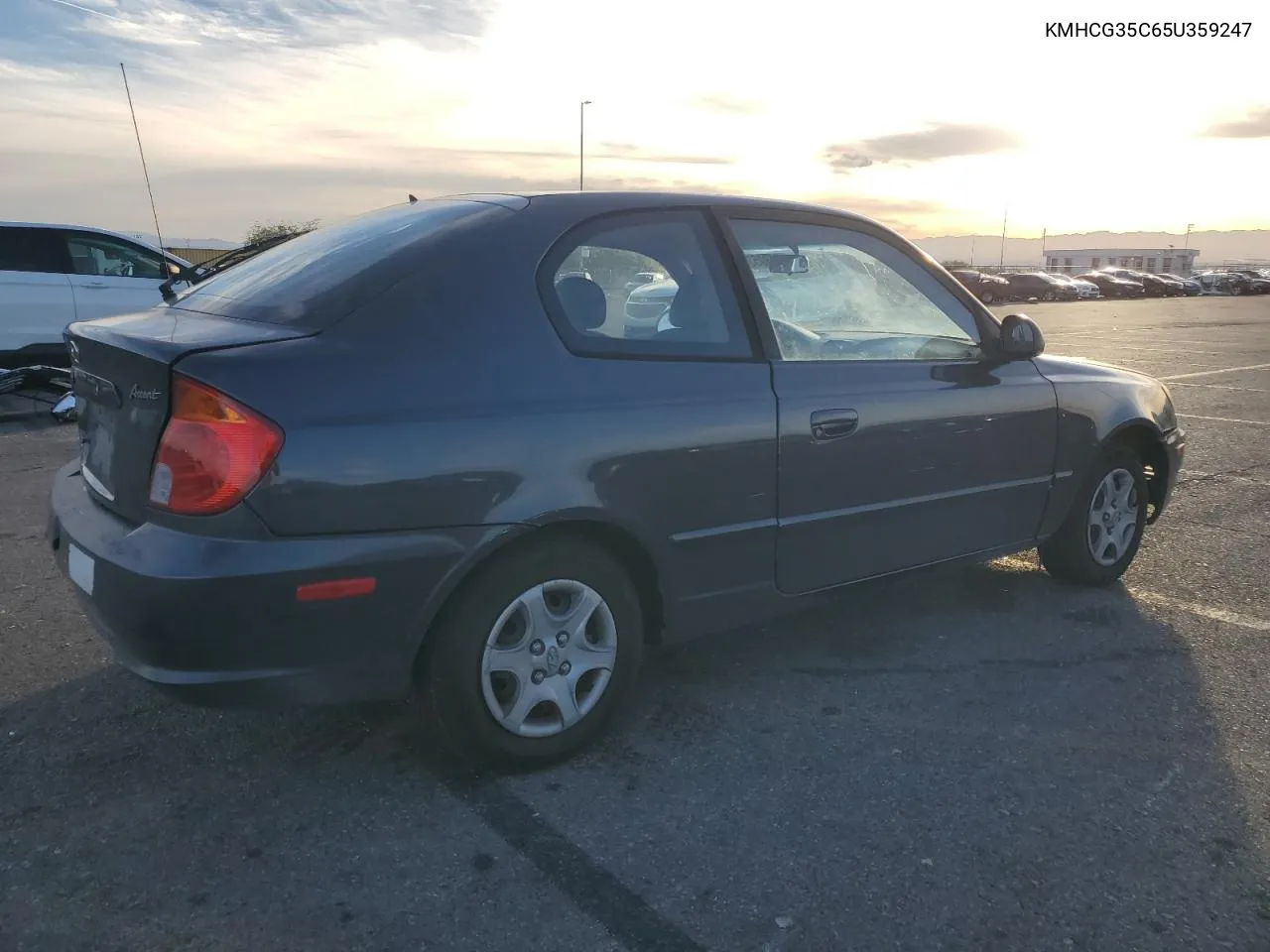 2005 Hyundai Accent Gs VIN: KMHCG35C65U359247 Lot: 79305324