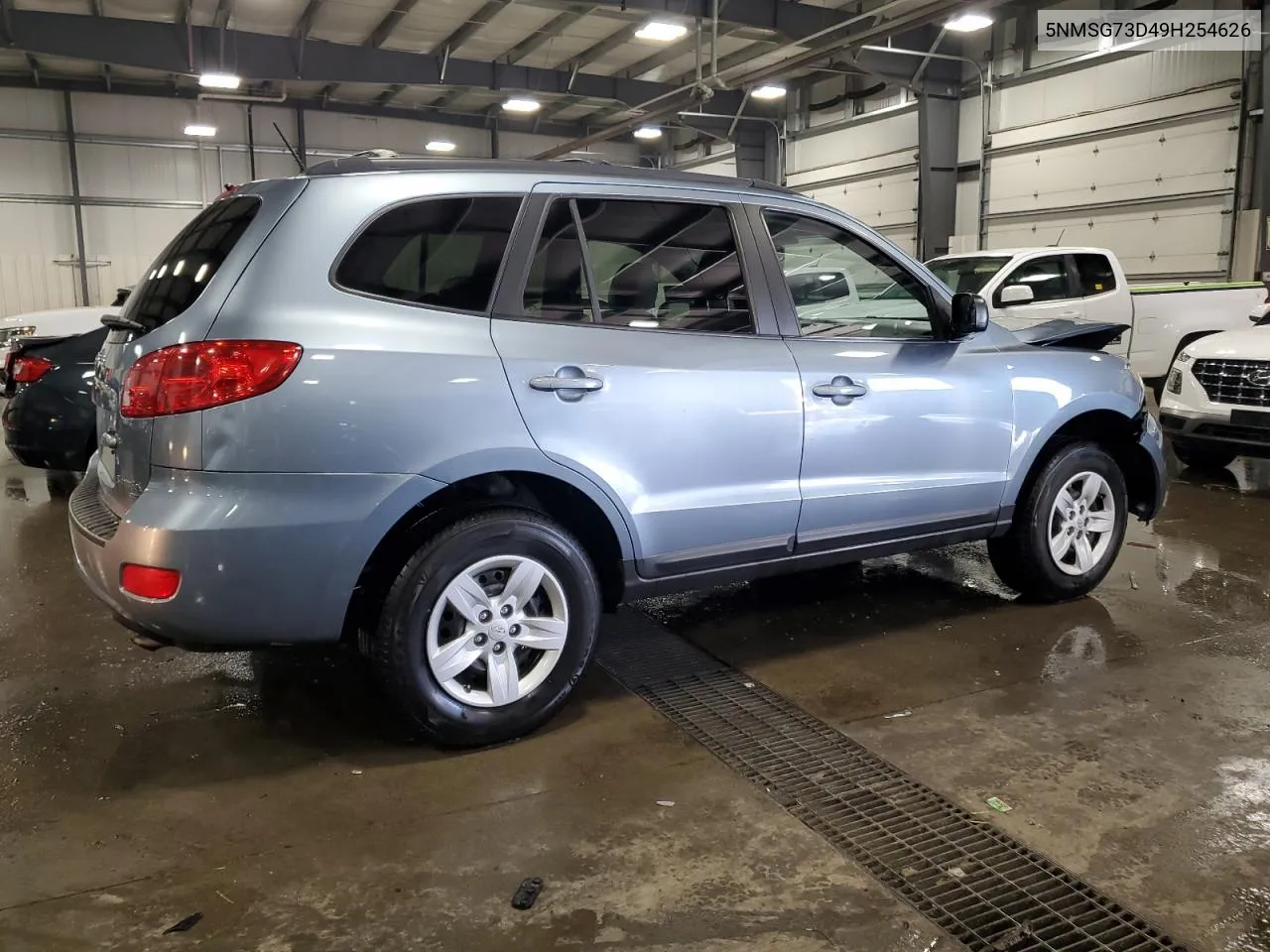 2009 Hyundai Santa Fe Gls VIN: 5NMSG73D49H254626 Lot: 70693824