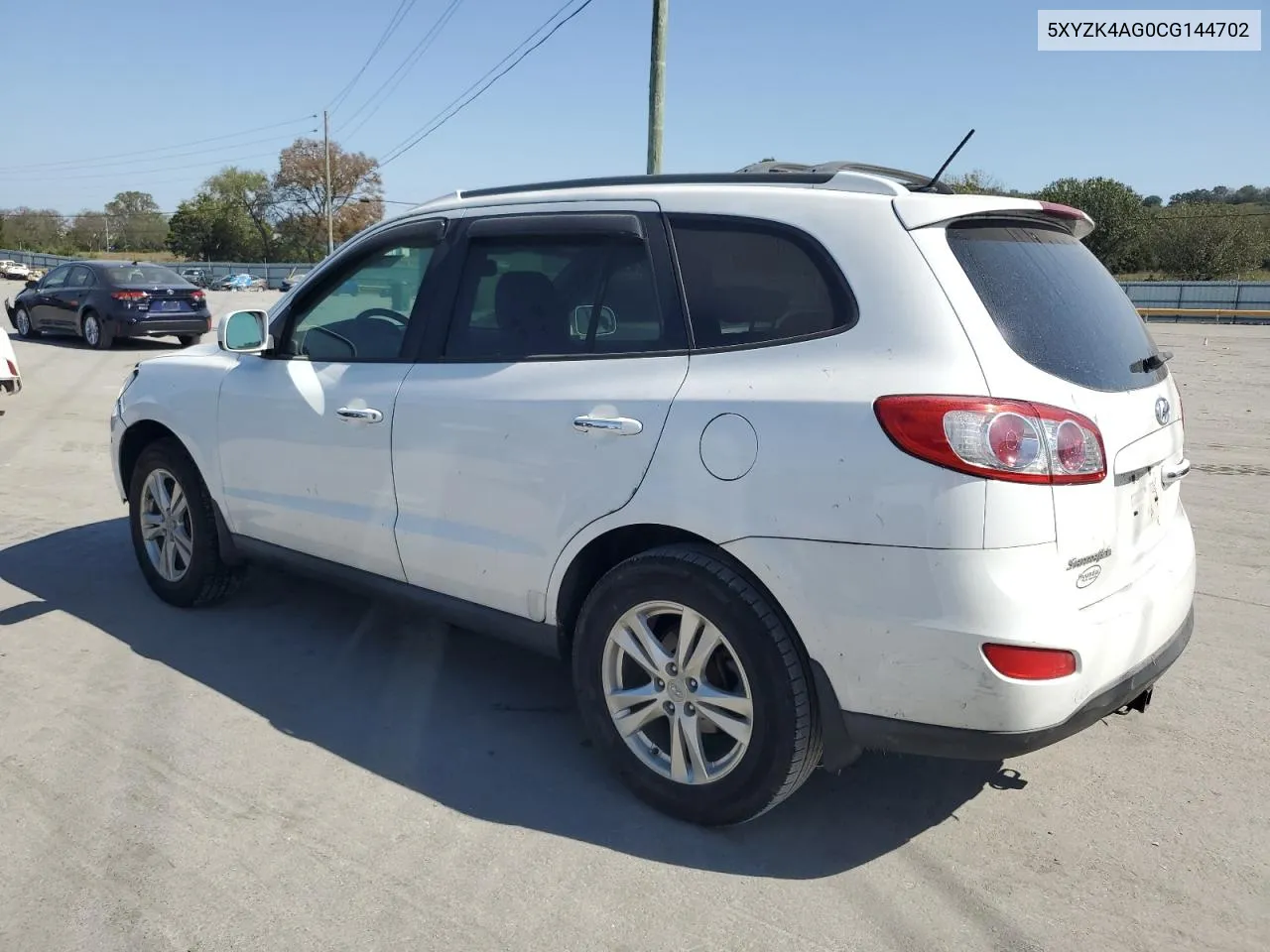 2012 Hyundai Santa Fe Limited VIN: 5XYZK4AG0CG144702 Lot: 75204044