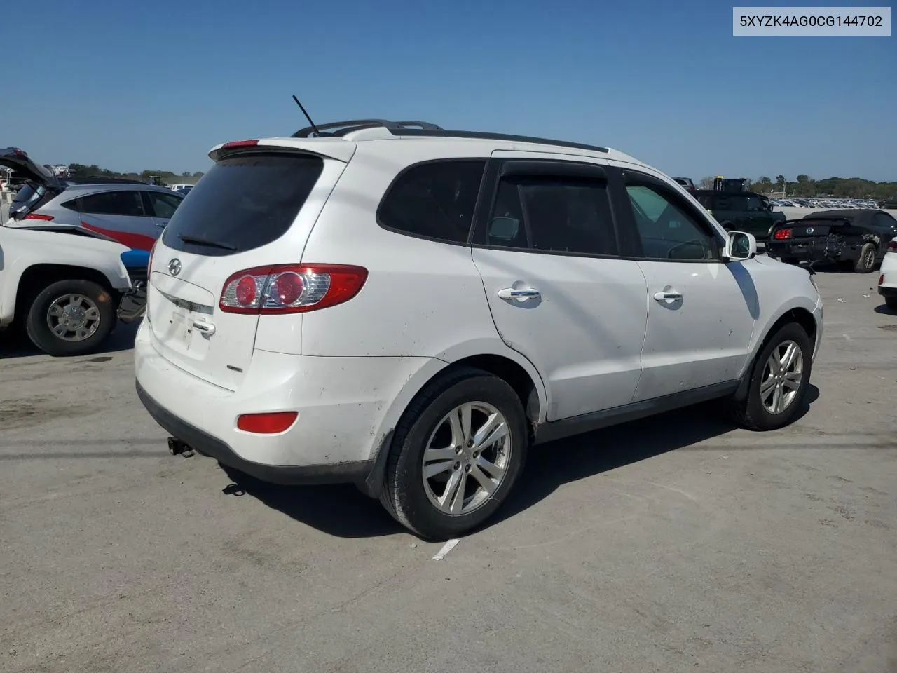 2012 Hyundai Santa Fe Limited VIN: 5XYZK4AG0CG144702 Lot: 75204044