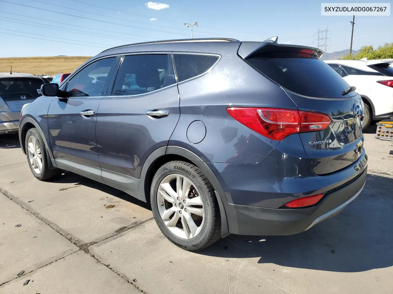 2013 Hyundai Santa Fe Sport VIN: 5XYZUDLA0DG067267 Lot: 74694494