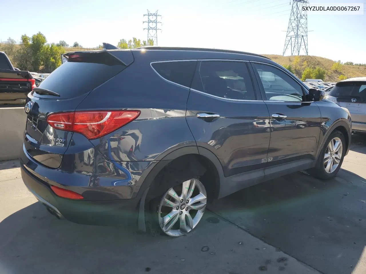 2013 Hyundai Santa Fe Sport VIN: 5XYZUDLA0DG067267 Lot: 74694494