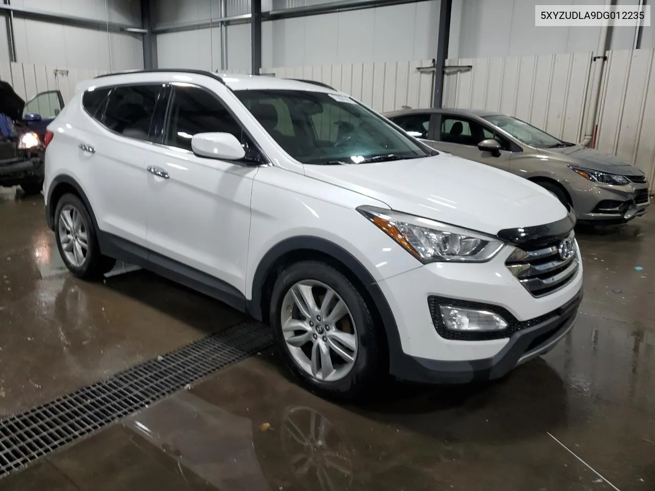 2013 Hyundai Santa Fe Sport VIN: 5XYZUDLA9DG012235 Lot: 77967944