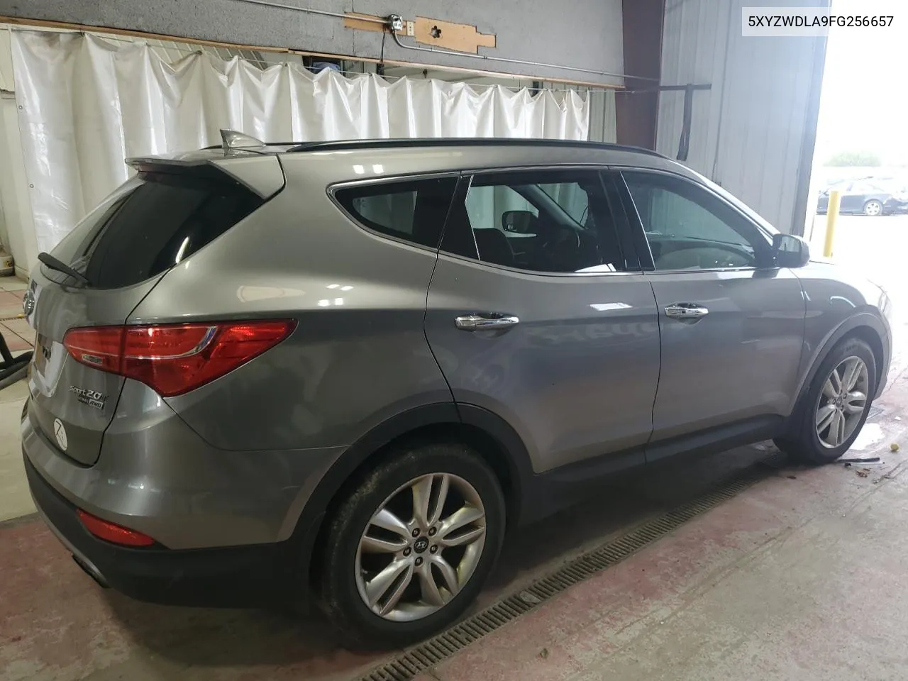 2015 Hyundai Santa Fe Sport VIN: 5XYZWDLA9FG256657 Lot: 76123004