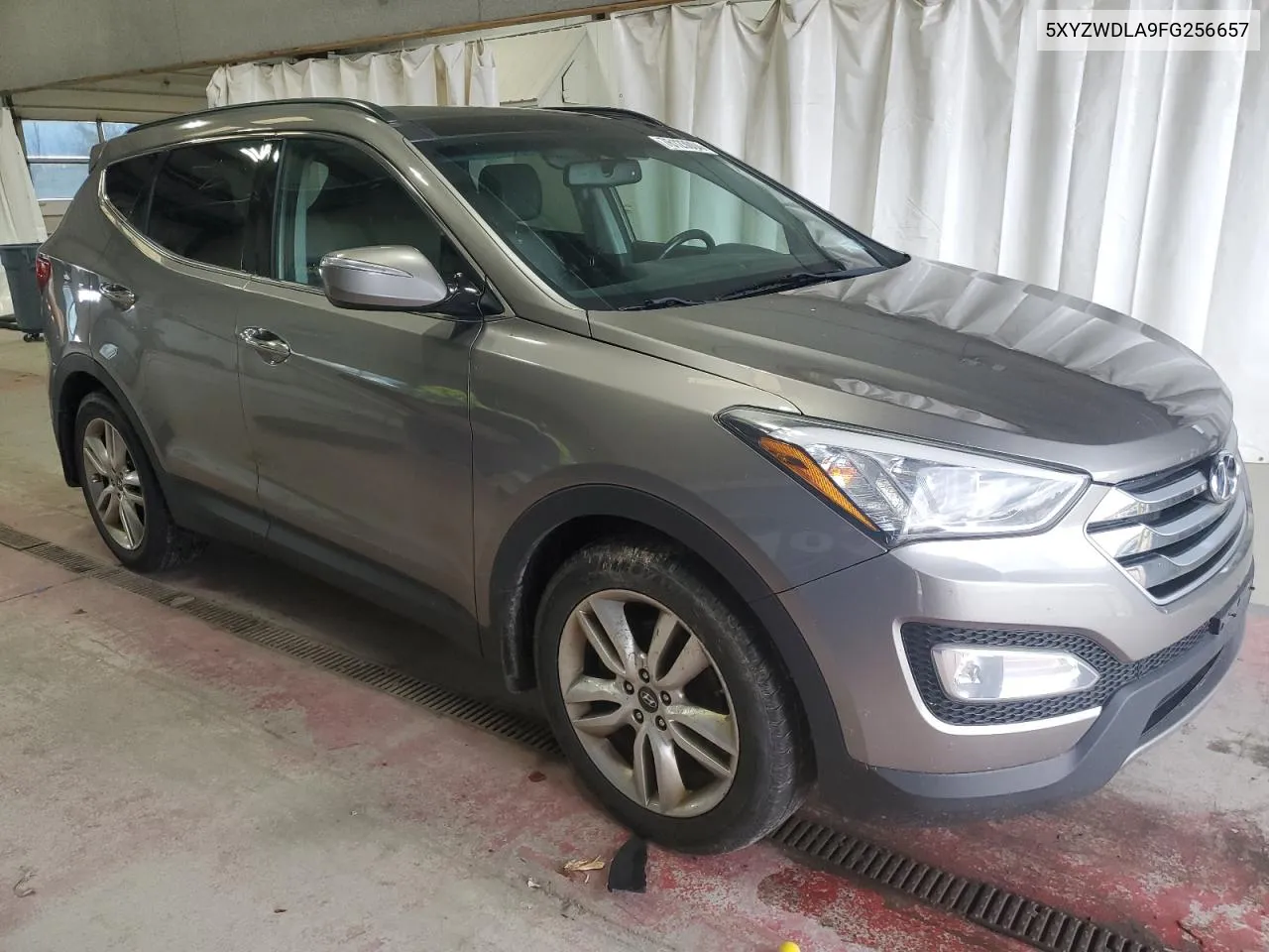 2015 Hyundai Santa Fe Sport VIN: 5XYZWDLA9FG256657 Lot: 76123004