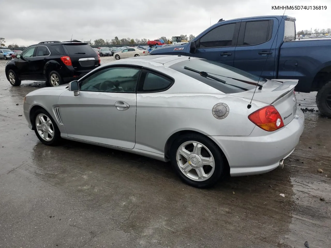 2004 Hyundai Tiburon VIN: KMHHM65D74U136819 Lot: 77932684