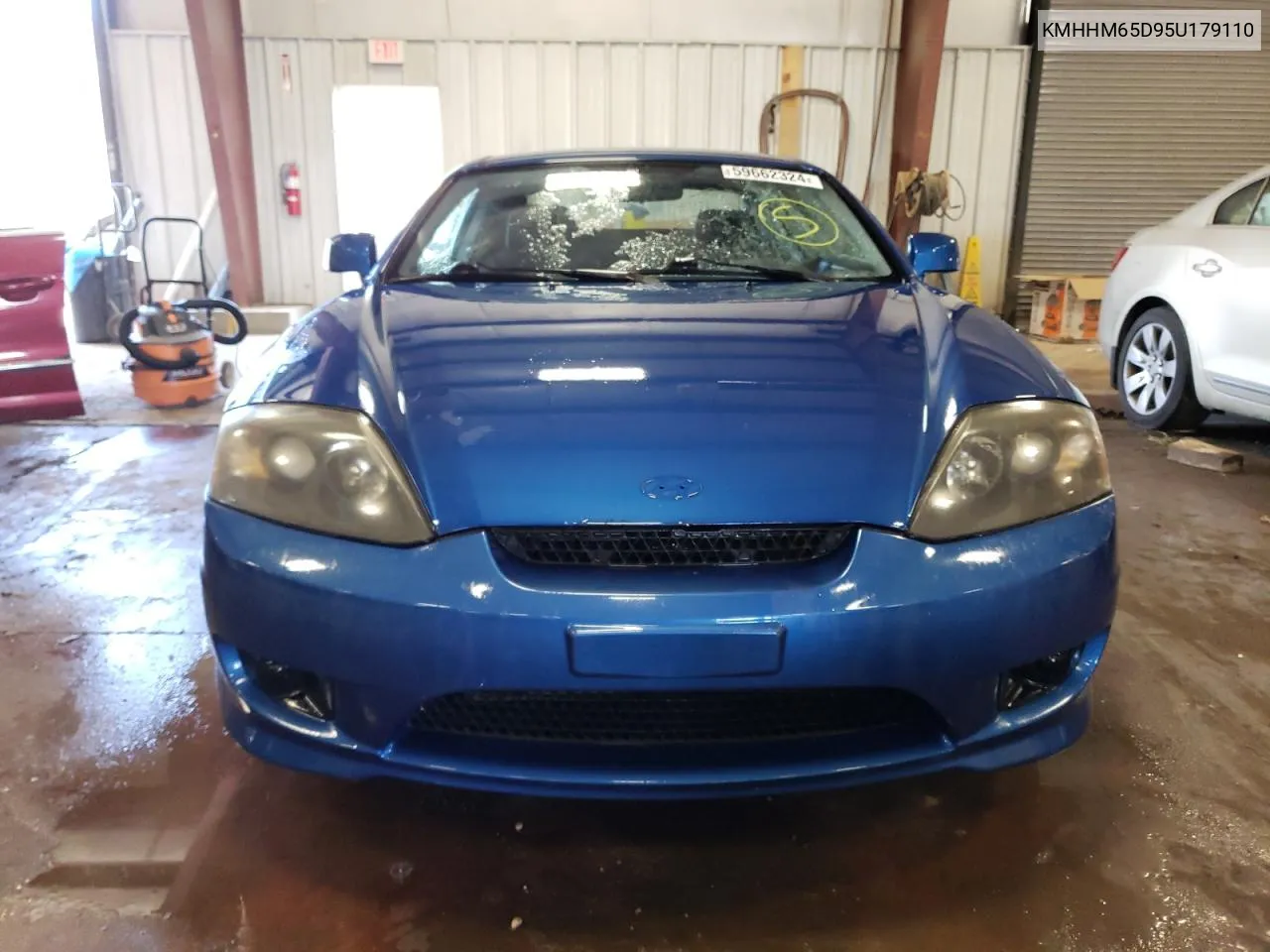 2005 Hyundai Tiburon VIN: KMHHM65D95U179110 Lot: 59662324