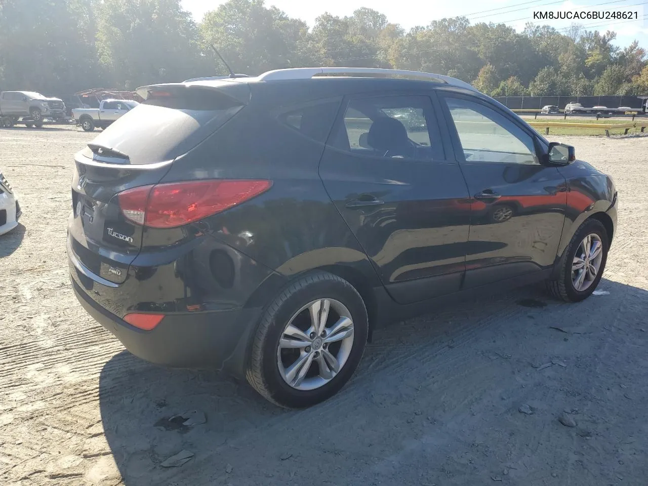 2011 Hyundai Tucson Gls VIN: KM8JUCAC6BU248621 Lot: 76448604