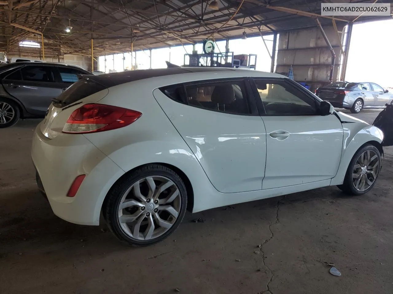 2012 Hyundai Veloster VIN: KMHTC6AD2CU062629 Lot: 66831924