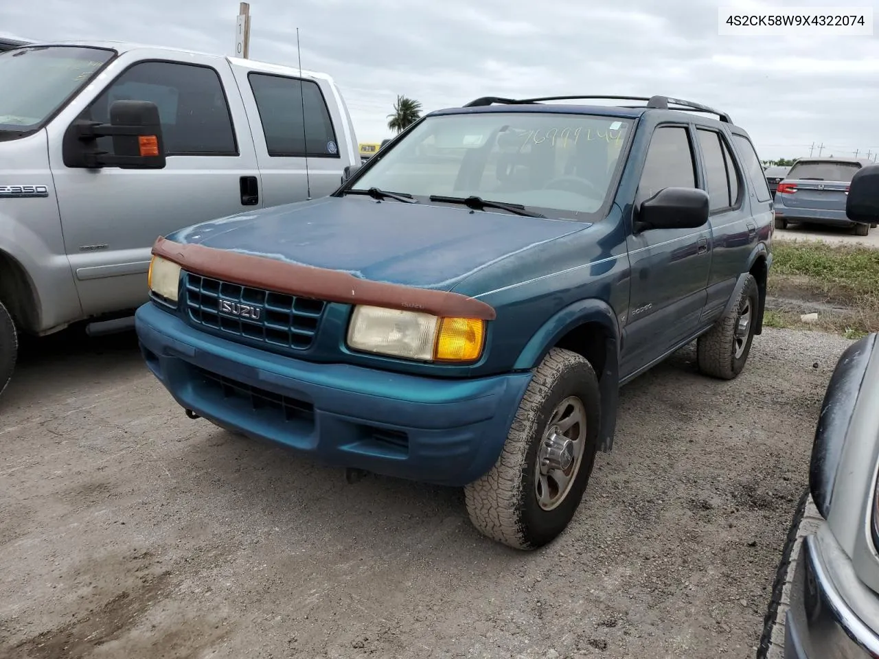 1999 Isuzu Rodeo S VIN: 4S2CK58W9X4322074 Lot: 76999244