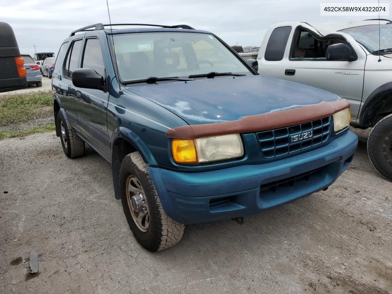 1999 Isuzu Rodeo S VIN: 4S2CK58W9X4322074 Lot: 76999244