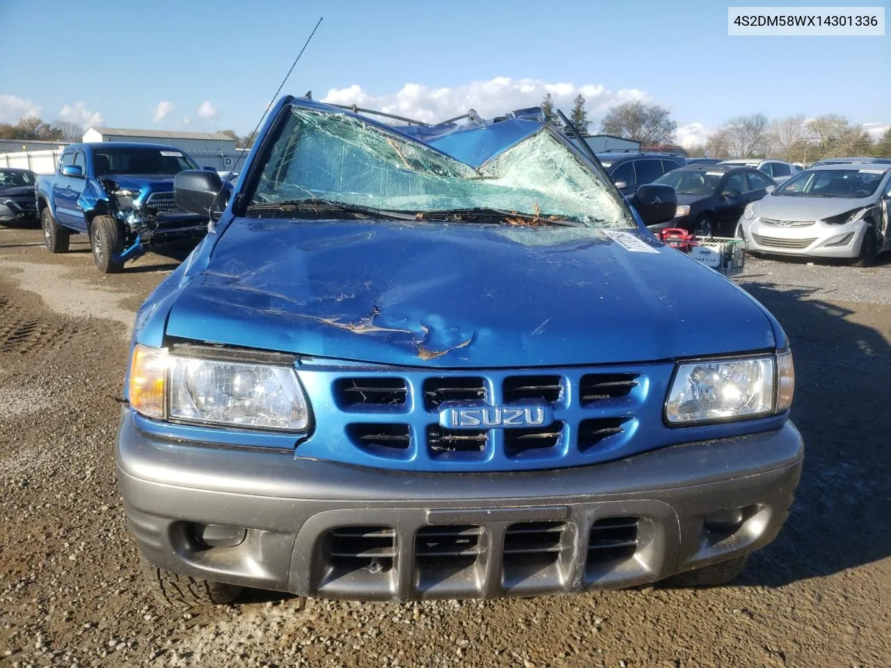 2001 Isuzu Rodeo S VIN: 4S2DM58WX14301336 Lot: 77770164