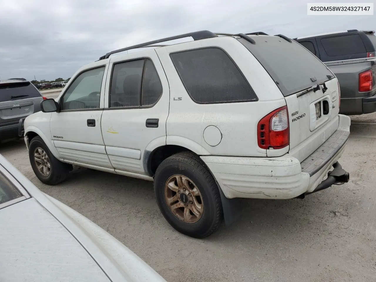 2002 Isuzu Rodeo S VIN: 4S2DM58W324327147 Lot: 75194104