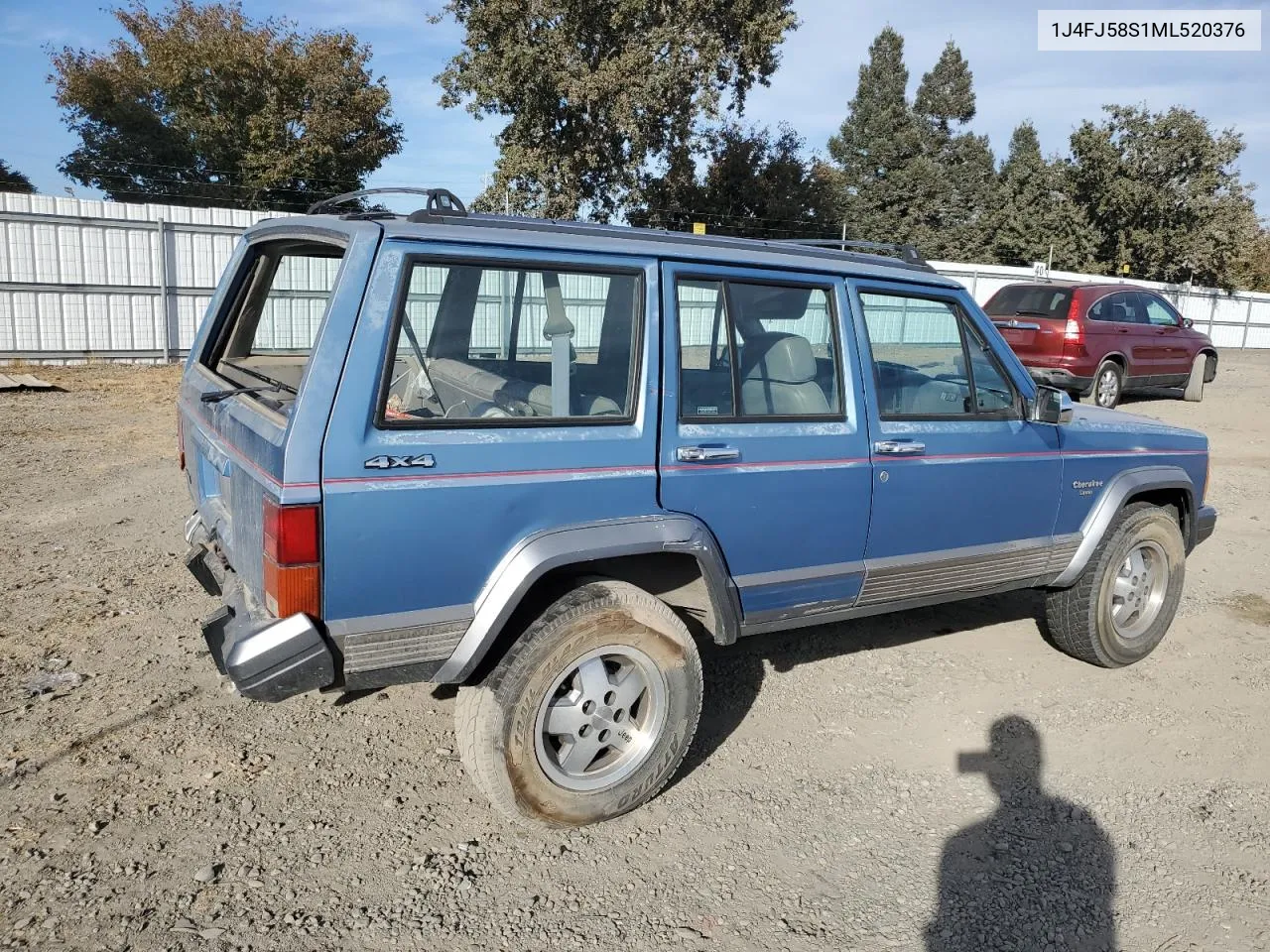 1991 Jeep Cherokee Laredo VIN: 1J4FJ58S1ML520376 Lot: 75452364