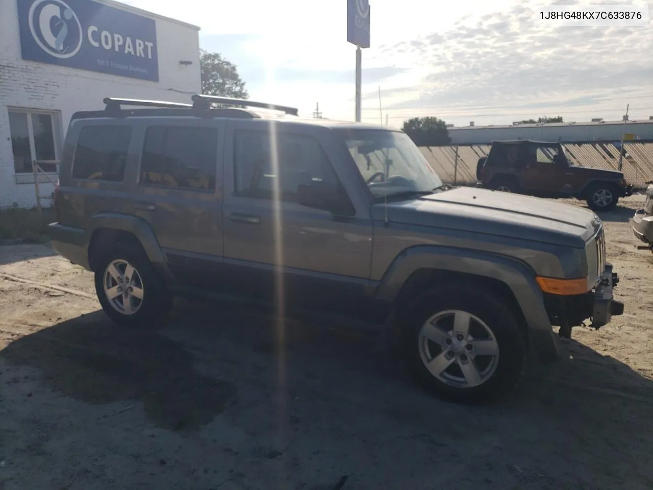 2007 Jeep Commander VIN: 1J8HG48KX7C633876 Lot: 57244344