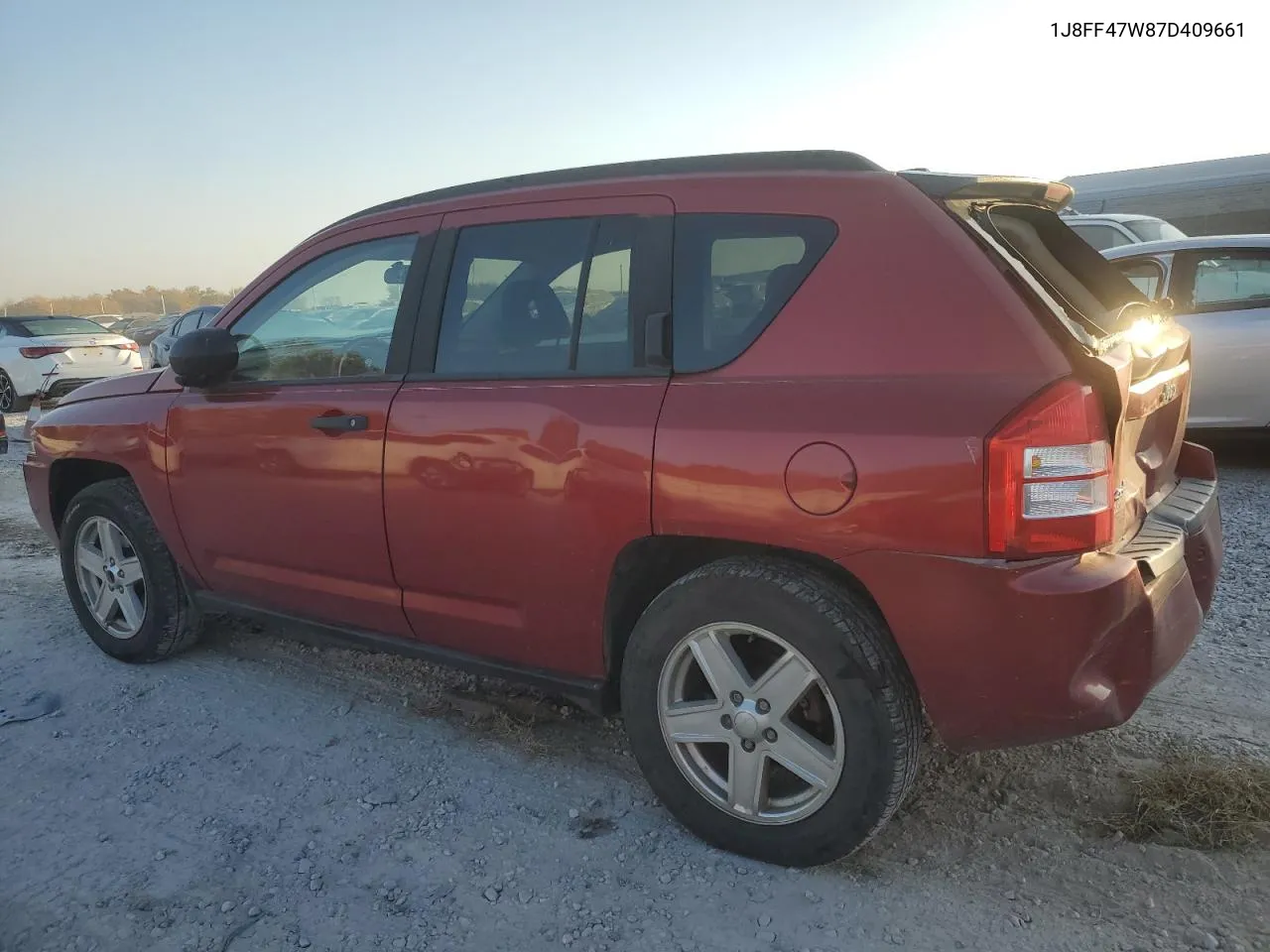 2007 Jeep Compass VIN: 1J8FF47W87D409661 Lot: 77316484