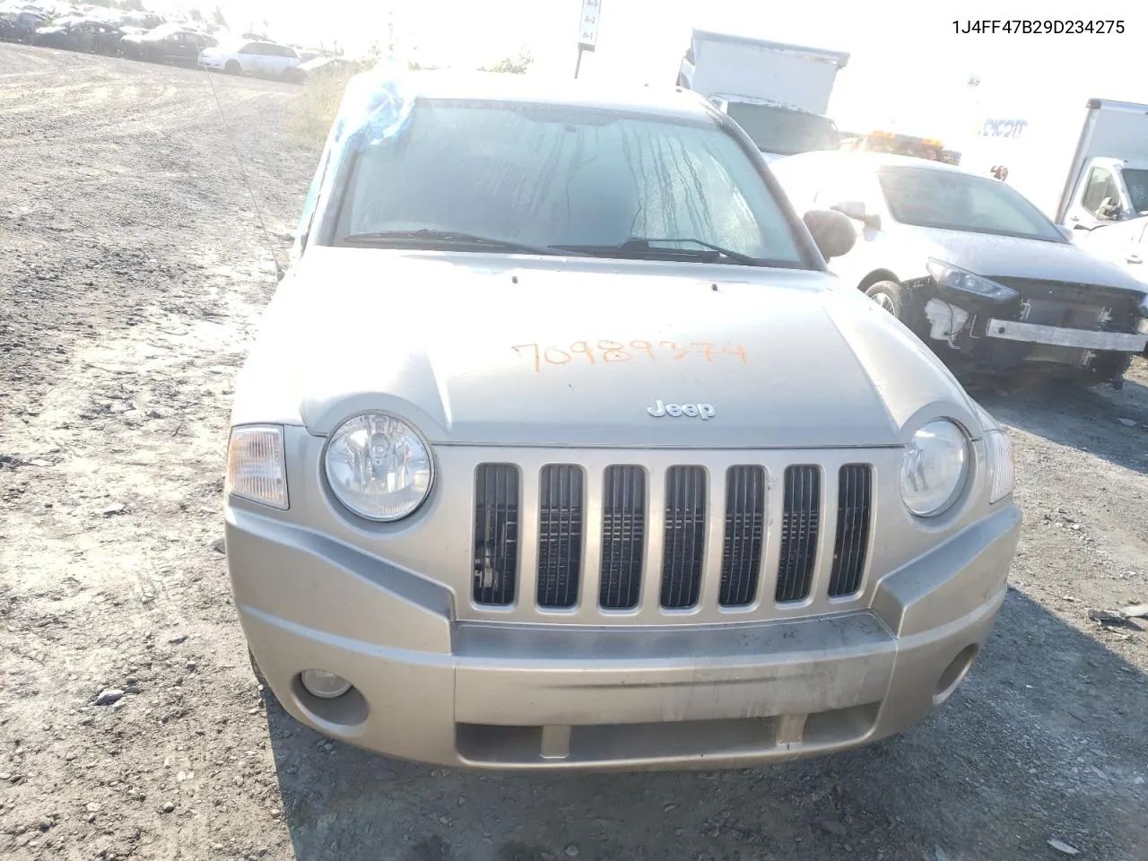 2009 Jeep Compass Sport VIN: 1J4FF47B29D234275 Lot: 70989374