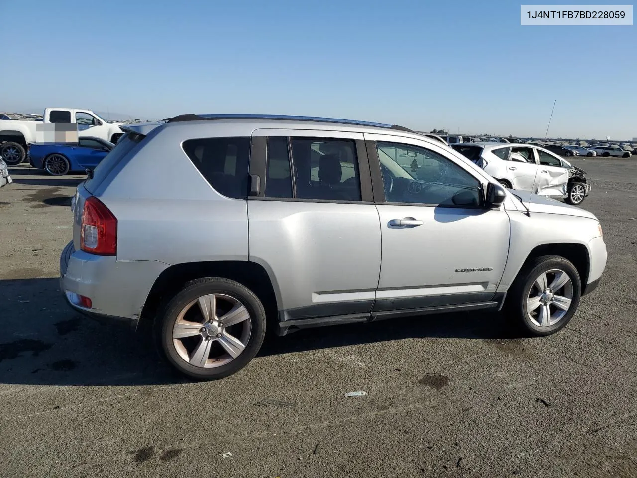 2011 Jeep Compass Sport VIN: 1J4NT1FB7BD228059 Lot: 73766644