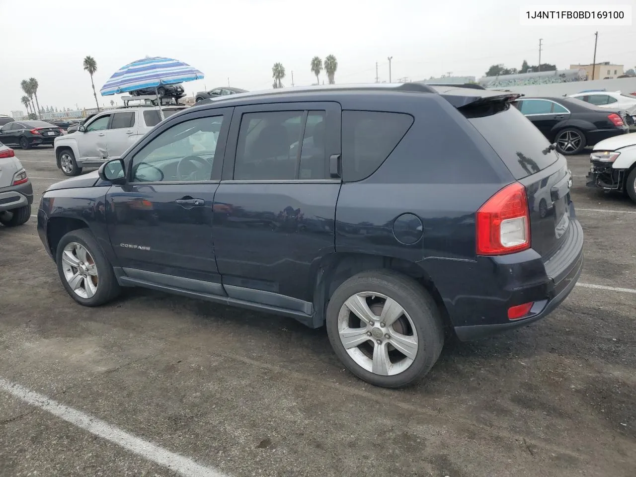 2011 Jeep Compass Sport VIN: 1J4NT1FB0BD169100 Lot: 76565304