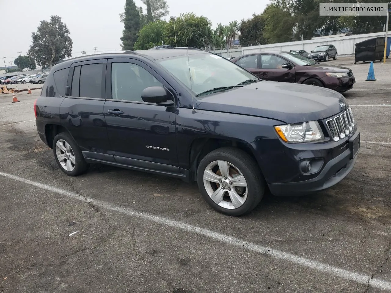 2011 Jeep Compass Sport VIN: 1J4NT1FB0BD169100 Lot: 76565304