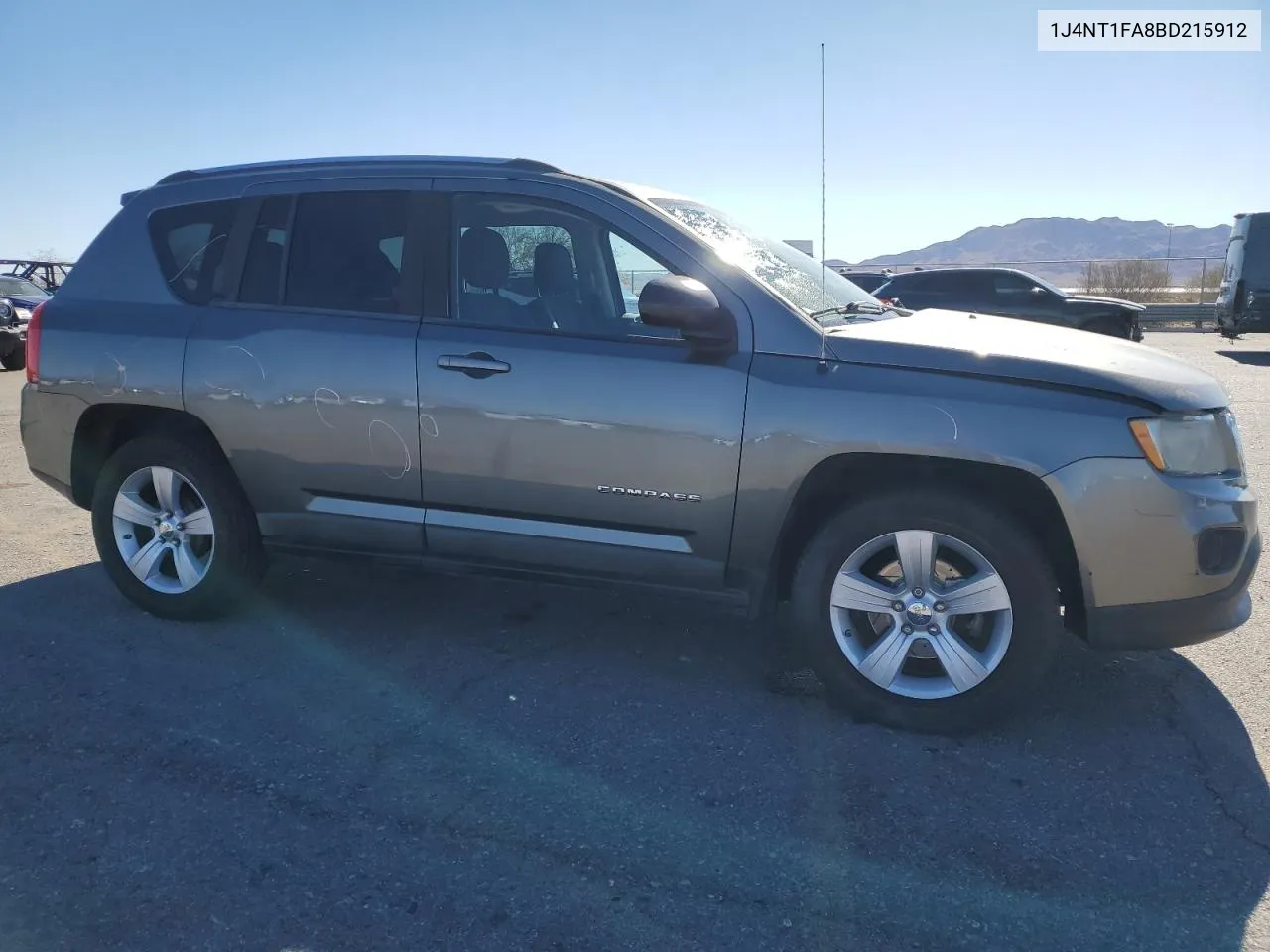 2011 Jeep Compass Sport VIN: 1J4NT1FA8BD215912 Lot: 79289104