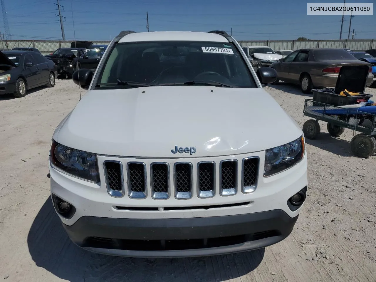 2016 Jeep Compass Sport VIN: 1C4NJCBA2GD611080 Lot: 66997704