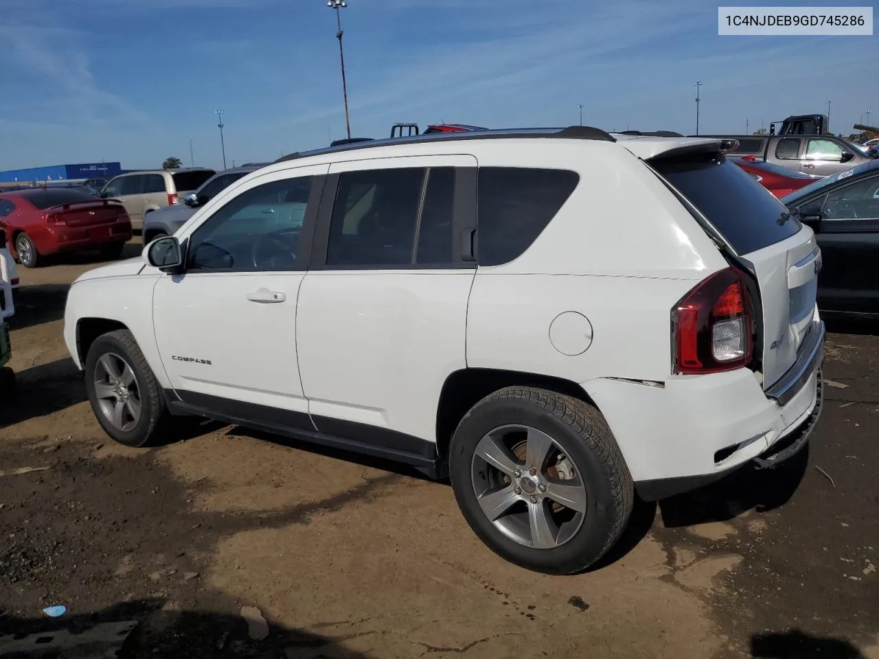 2016 Jeep Compass Latitude VIN: 1C4NJDEB9GD745286 Lot: 74009264