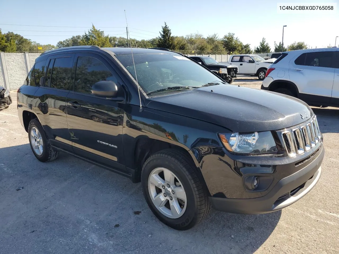 2016 Jeep Compass Sport VIN: 1C4NJCBBXGD765058 Lot: 77422774