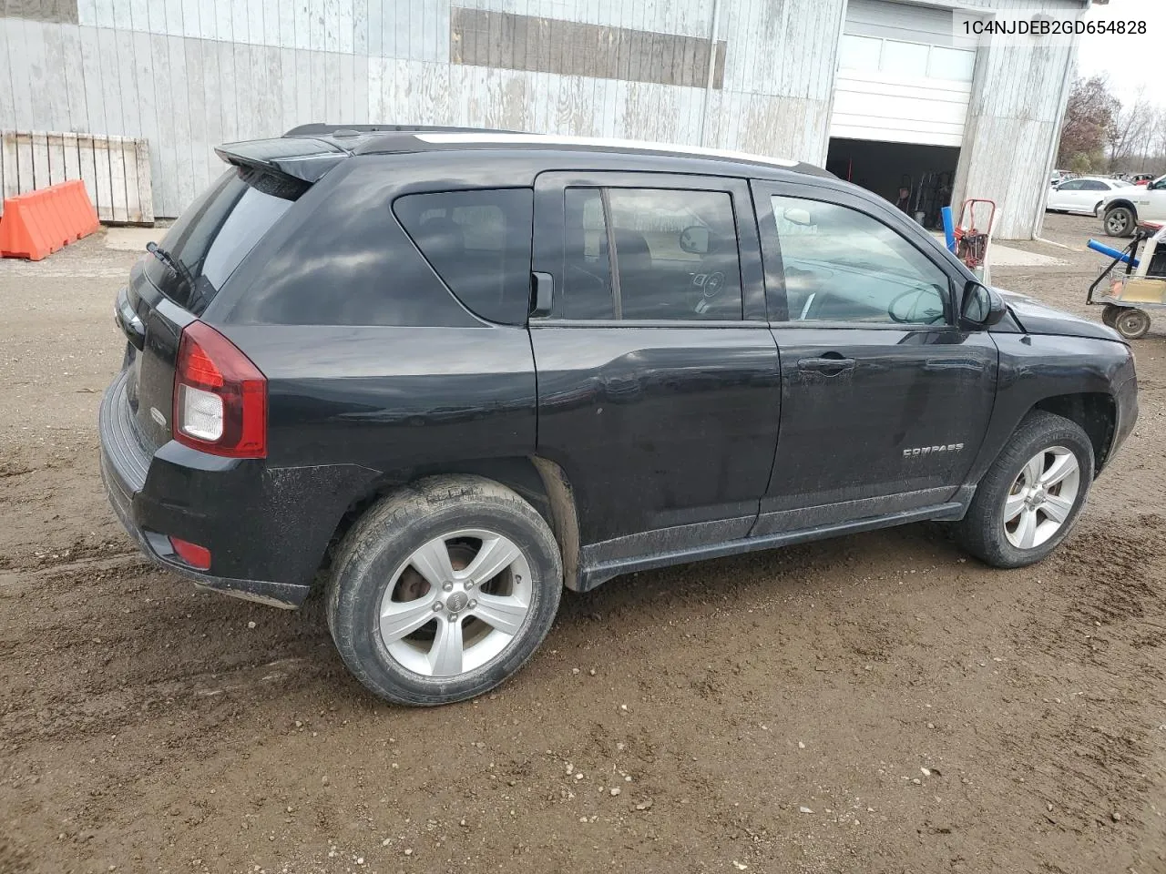 2016 Jeep Compass Latitude VIN: 1C4NJDEB2GD654828 Lot: 79137284