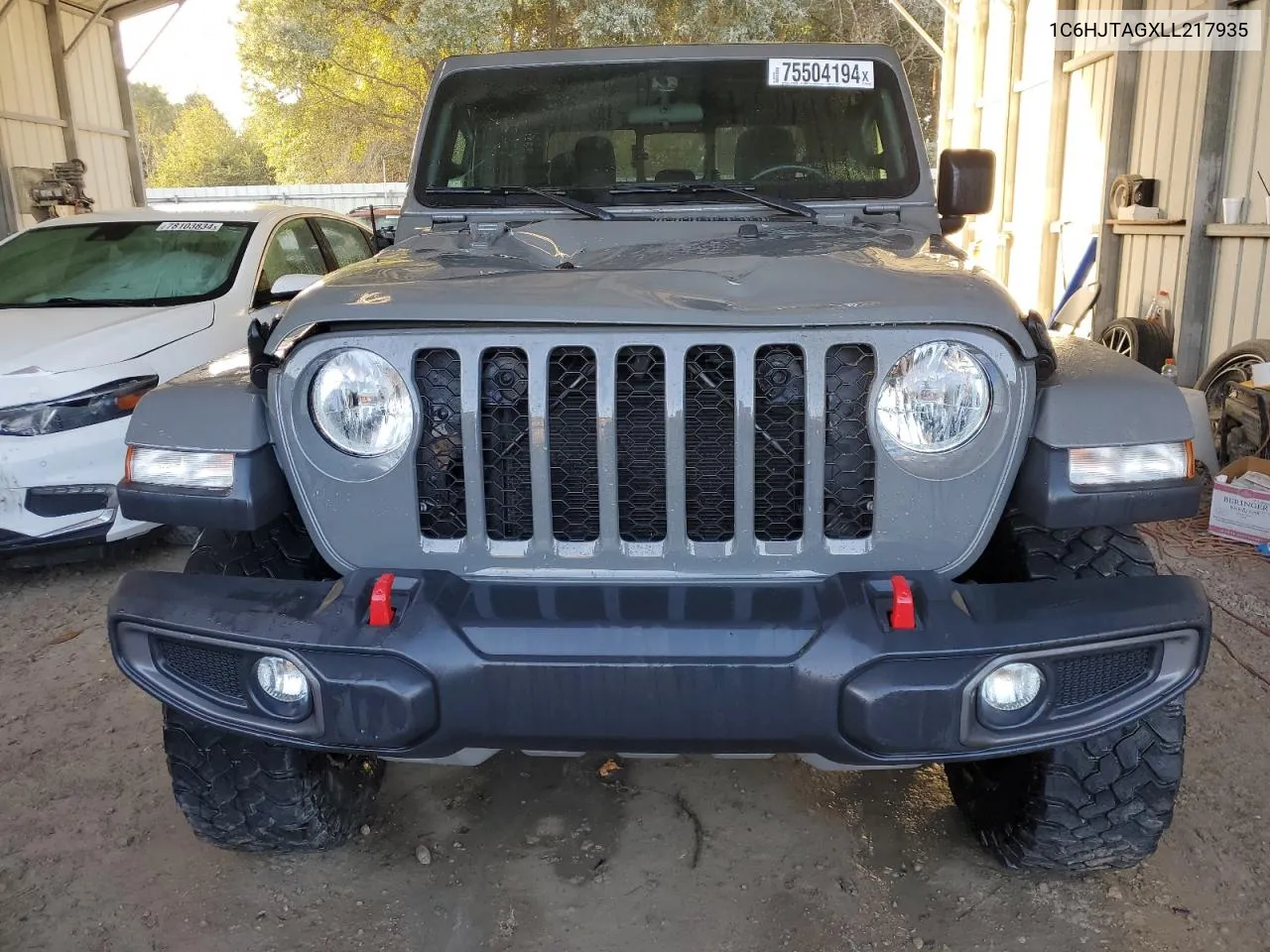 2020 Jeep Gladiator Sport VIN: 1C6HJTAGXLL217935 Lot: 75504194