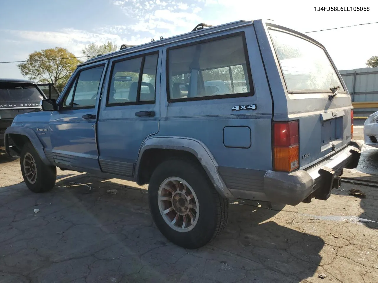 1990 Jeep Cherokee Laredo VIN: 1J4FJ58L6LL105058 Lot: 70254674