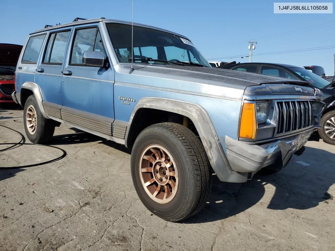 1990 Jeep Cherokee Laredo VIN: 1J4FJ58L6LL105058 Lot: 70254674