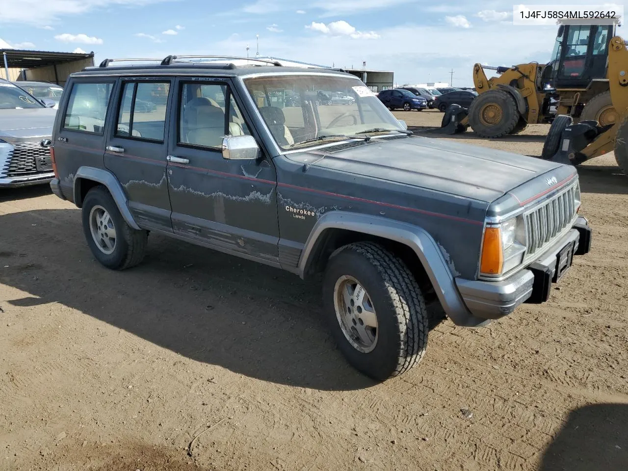 1991 Jeep Cherokee Laredo VIN: 1J4FJ58S4ML592642 Lot: 69472814