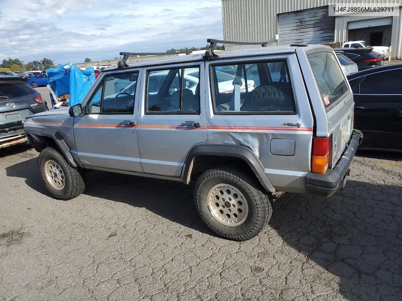 1991 Jeep Cherokee Sport VIN: 1J4FJ88S6ML629711 Lot: 75443884