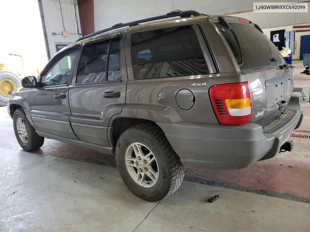 1999 Jeep Grand Cherokee Laredo VIN: 1J4GW58NXXC692099 Lot: 68744334