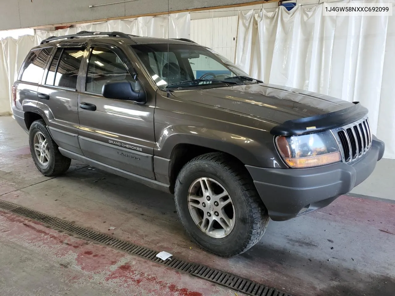 1999 Jeep Grand Cherokee Laredo VIN: 1J4GW58NXXC692099 Lot: 68744334