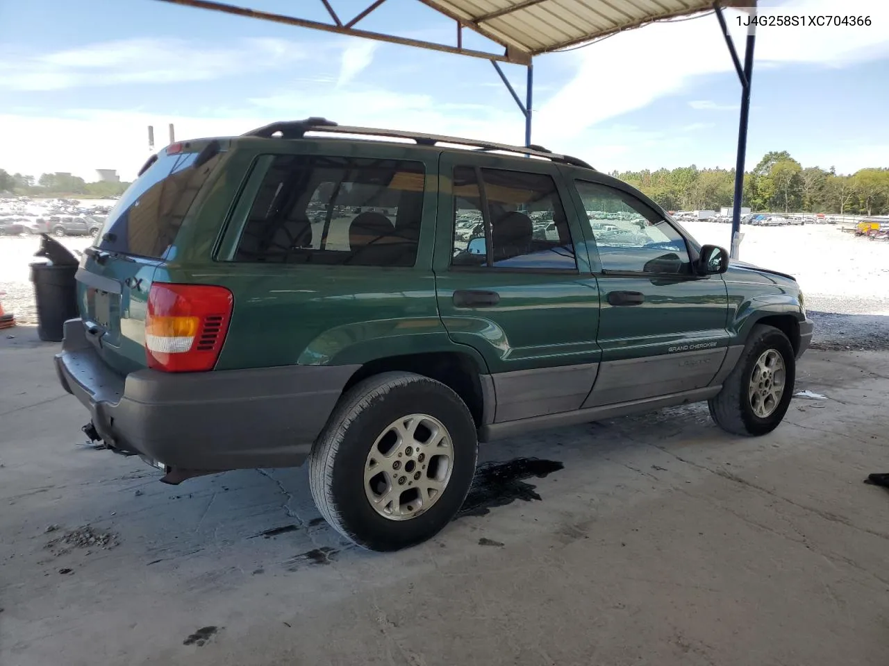 1999 Jeep Grand Cherokee Laredo VIN: 1J4G258S1XC704366 Lot: 69999004