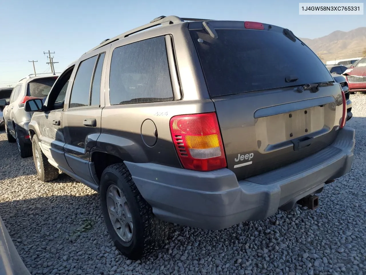 1999 Jeep Grand Cherokee Laredo VIN: 1J4GW58N3XC765331 Lot: 74377174