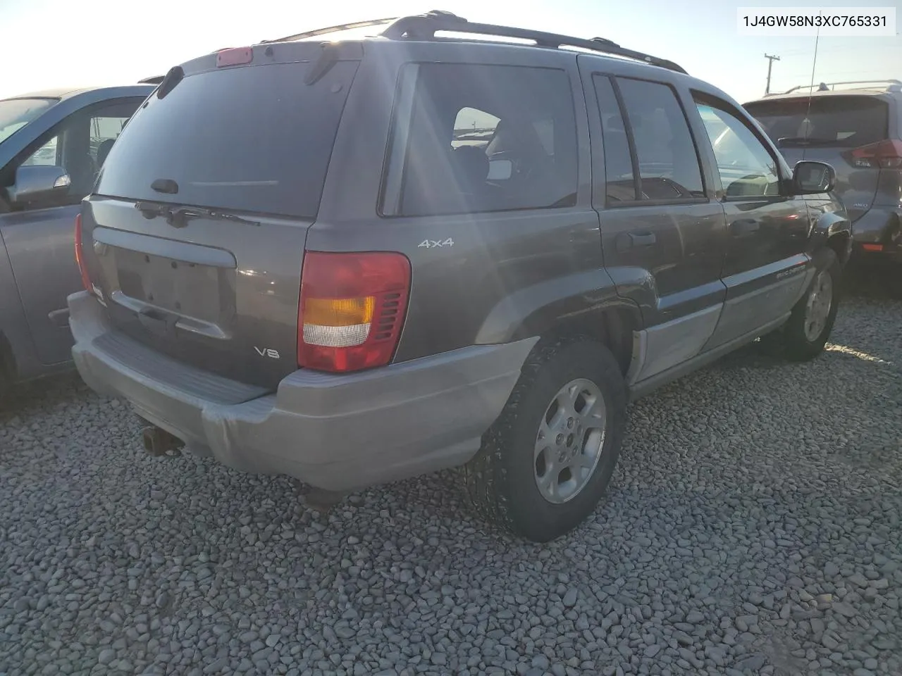 1999 Jeep Grand Cherokee Laredo VIN: 1J4GW58N3XC765331 Lot: 74377174