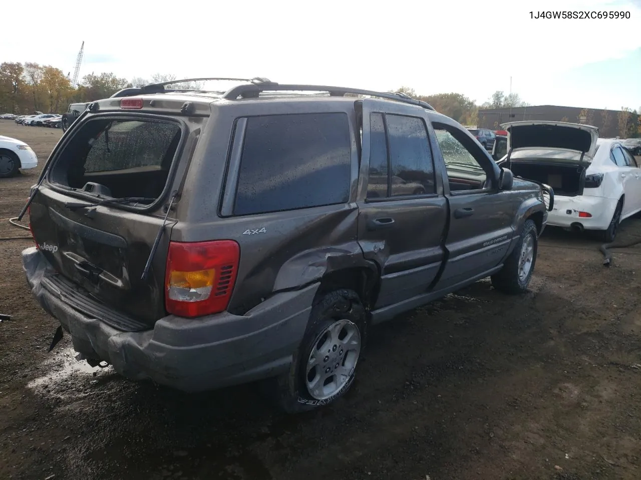 1999 Jeep Grand Cherokee Laredo VIN: 1J4GW58S2XC695990 Lot: 76291094