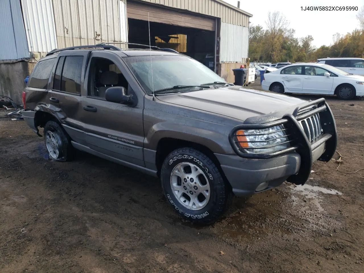 1999 Jeep Grand Cherokee Laredo VIN: 1J4GW58S2XC695990 Lot: 76291094