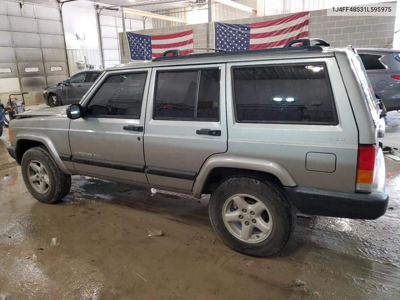 2001 Jeep Cherokee Sport VIN: 1J4FF48S31L595975 Lot: 65106344