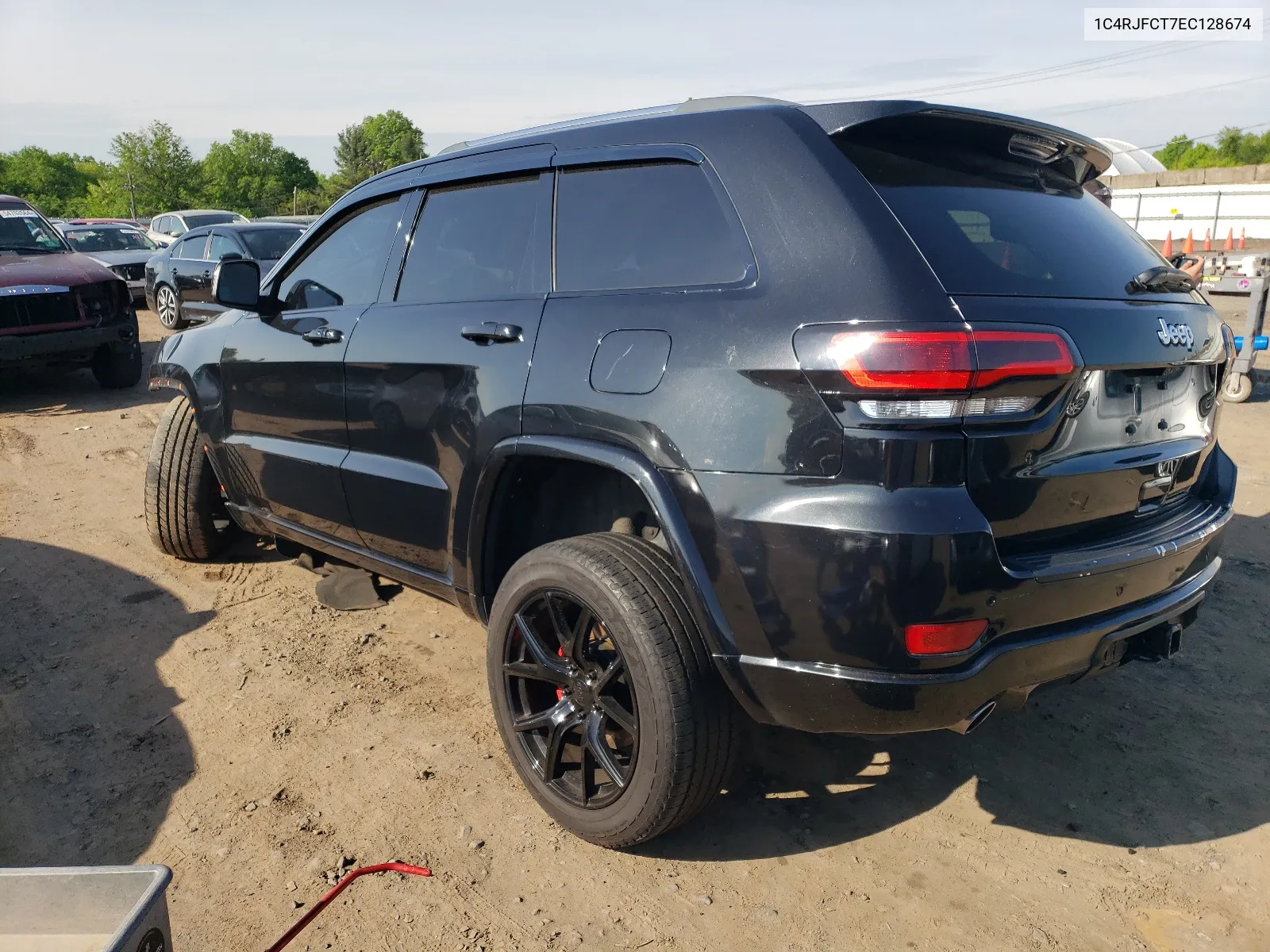 2014 Jeep Grand Cherokee Overland VIN: 1C4RJFCT7EC128674 Lot: 65703194